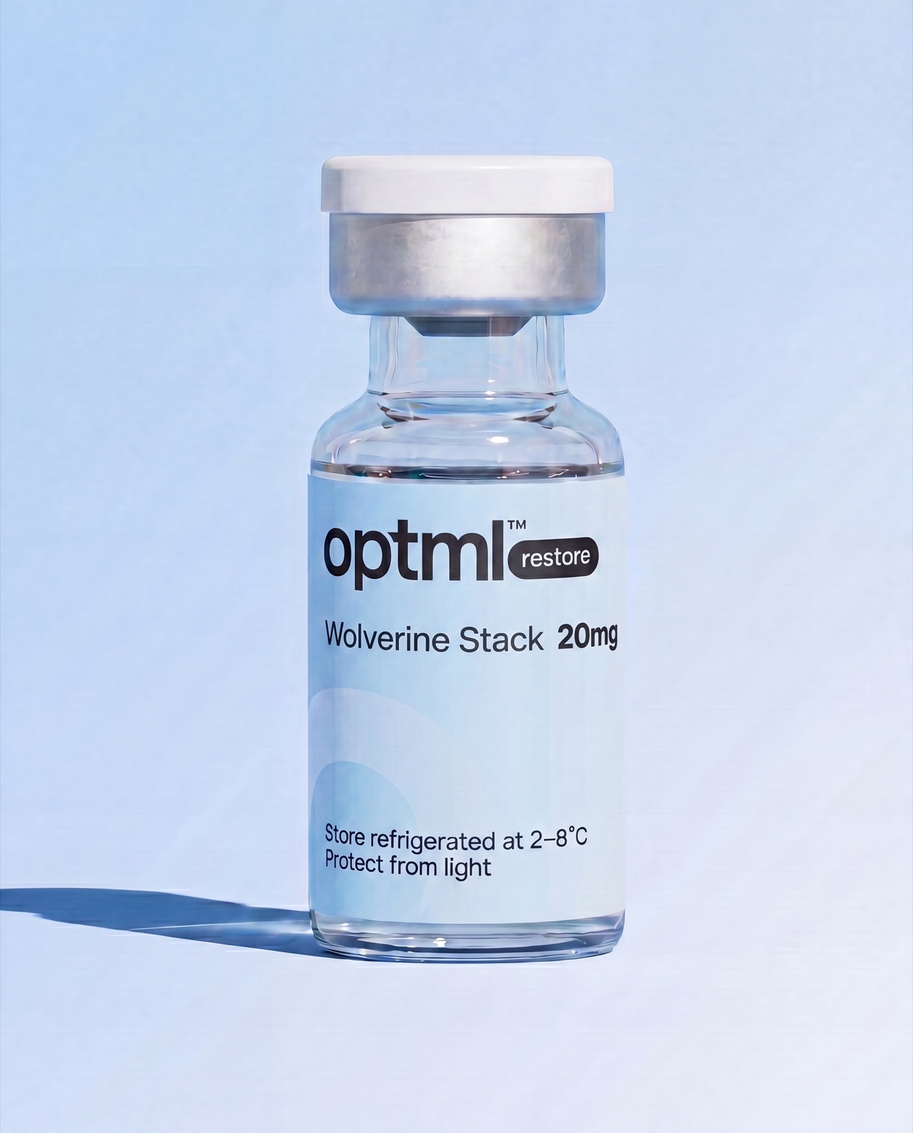 OPTML Wolverine Stack 20mg research product on a blue studio background